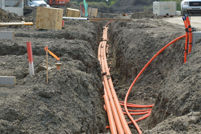 A trench dug for powerline installation by Superior Trenching Ltd. commercial trenching & excavation services