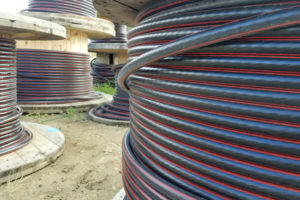 Spools of electrical wire used for Subdivision Underground Residential Development Services by Superior Trenching Ltd.